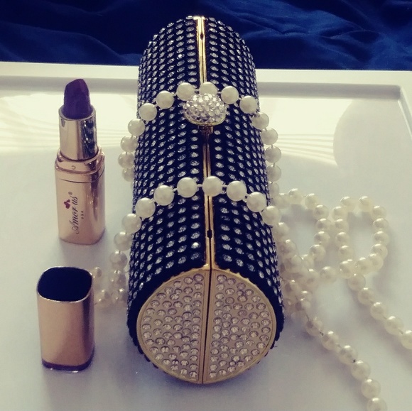 Handbags - Brand new rhinestone-covered clutch.